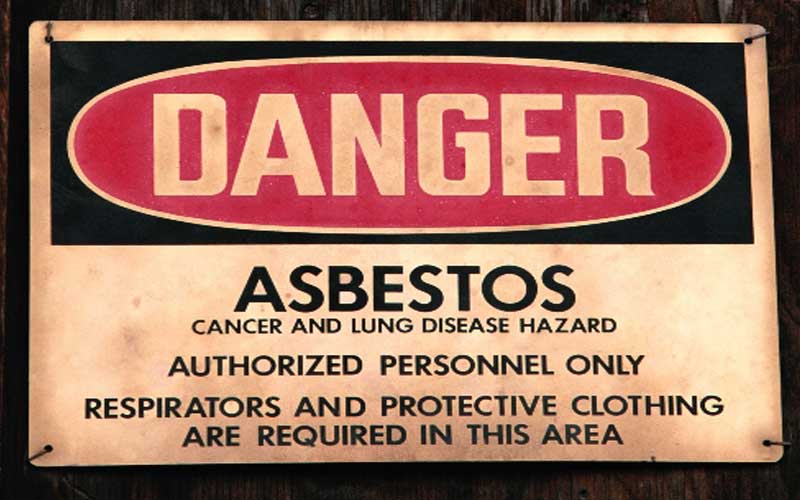 Photo of an asbestos label used to represent asbestos training as part of our Kansas safety training program.