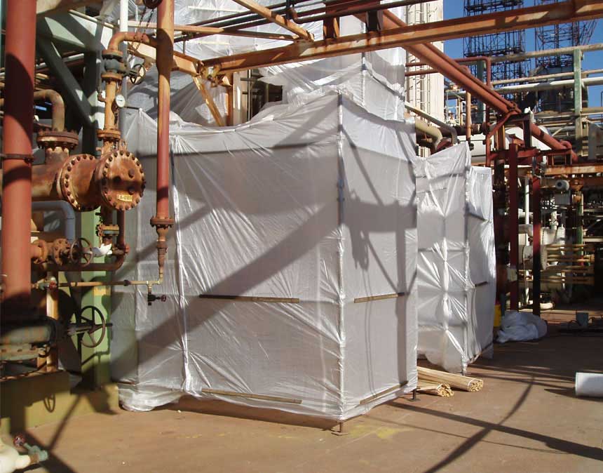 A photo of iSi Industrial Services' asbestos abatement project at an oil refinery.