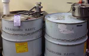 Photo of drums managed by hazardous waste handlers.
