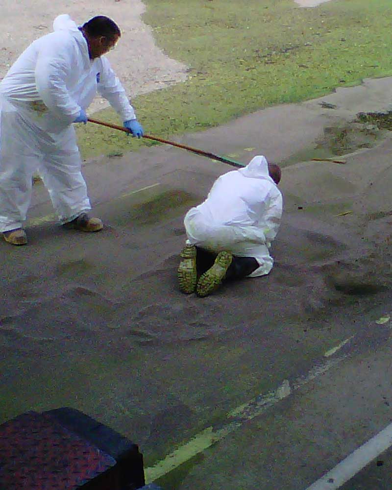 iSi environmental technicians clean up a hazardous materials spill at a manufacturing facility.